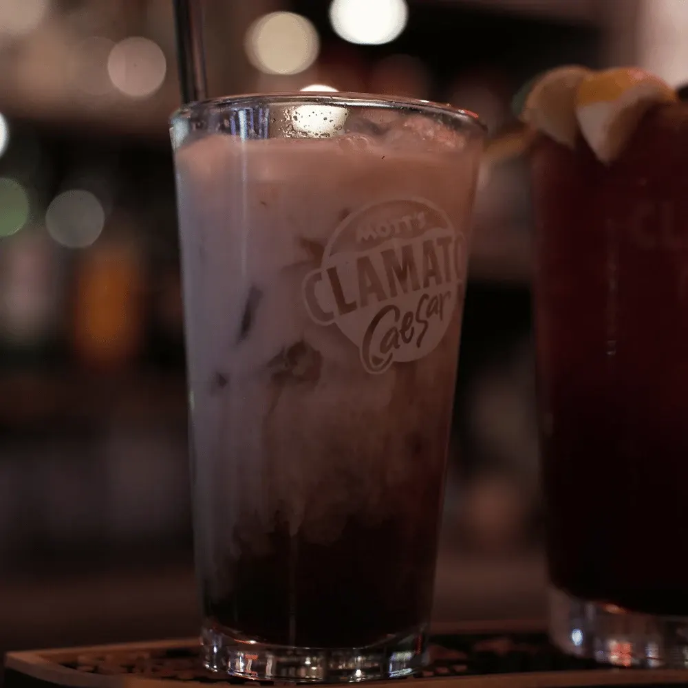 An iced white Caesar in a Clamato glass